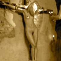 Naked Woman Crucified
