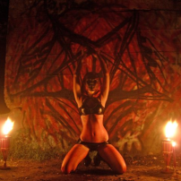Woman Performs Satanic Ritual