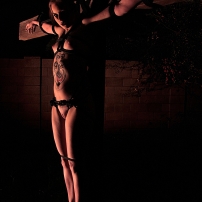 Nude Woman Crucified